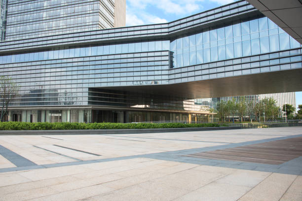 istock modern glass building agaisnt sky 866939538