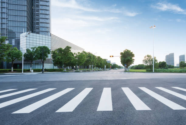 city road empty road with modern buildings on background,shanghai,china. zebra crossing photos stock pictures, royalty-free photos & images