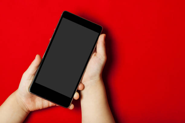 istock smart phone in the hands of a child 866941510