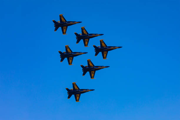 U.S. Navy Blue Angels 1-6 in a delta  formation from below in precision coordinated flight maneuvers at the 2017 Huntington Beach Air Show.
