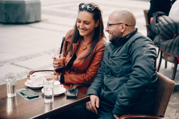 istock Couple in love drinking coffee in coffee shop 866945454