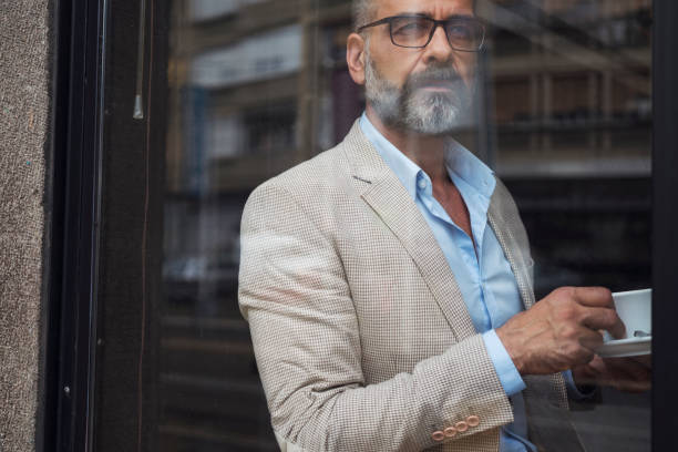 istock Dedicated Businessman Working At Cafe 866947622