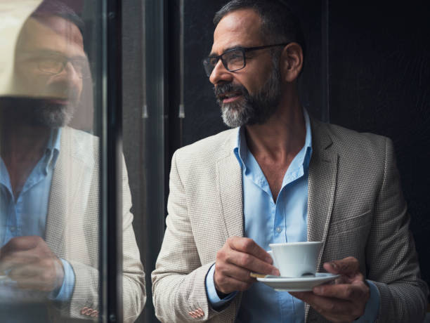 istock Dedicated Businessman Working At Cafe 866947694