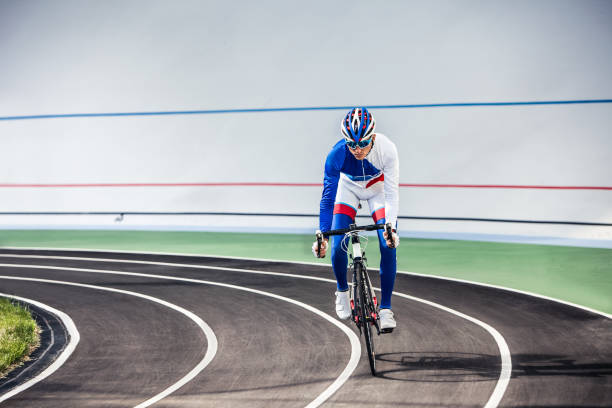 istock Racing cyclist on velodrome outdoor. 866947920