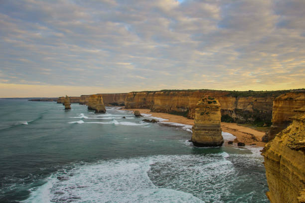Helicopter aerial view of Twelve Apostles along Great Ocean Road during a storm - Port Campbell, Australia.