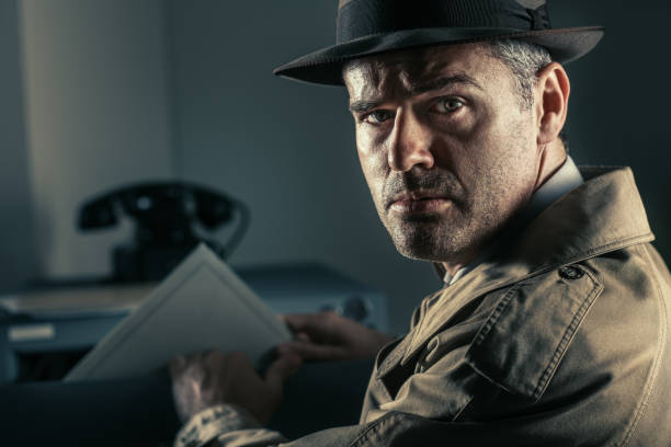 istock Vintage spy stealing files in the office 866962756