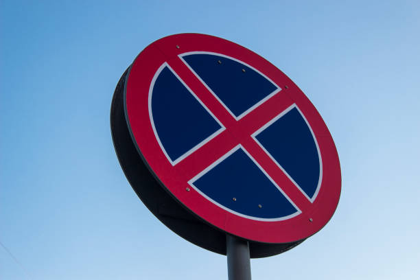 istock Road sign stop prohibited against a blue sky background 866962816