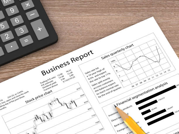 istock Business plan report wooden desk top view 866966350