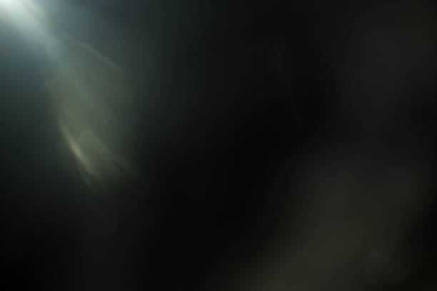 istock Real Lens Flare Shot on Black Background. 866972582