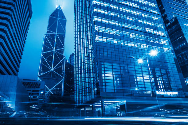 istock traffic trails in downtown hong kong 866981702