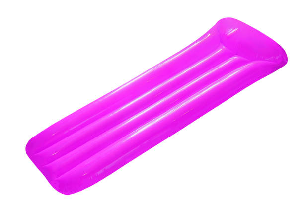 istock Violet inflatable floating pool raft mattress isolated on white background. 866986688