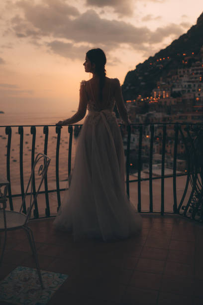 istock Bride on the terrace enjoying a view 866987384