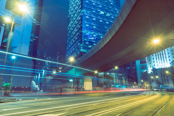 istock traffic trails in downtown hong kong 866987778