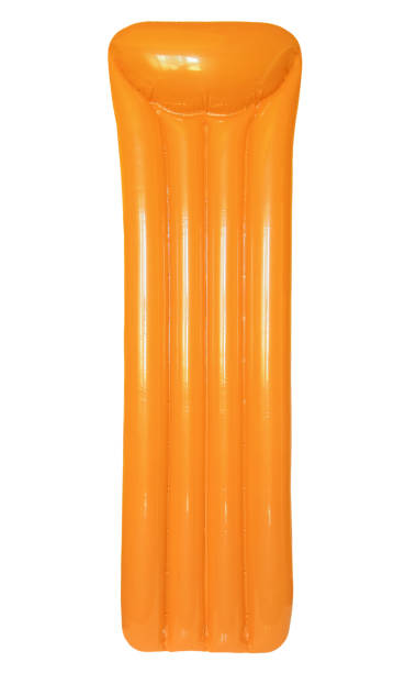 istock Orange inflatable floating pool raft mattress isolated on white background. 866988310