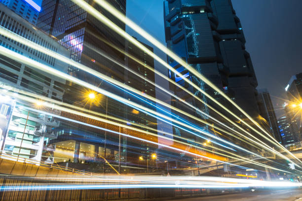 istock traffic trails in downtown Hong Kong 866988318