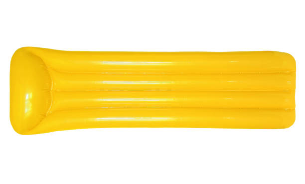 istock Yellow inflatable floating pool raft mattress isolated on white background. 866990796