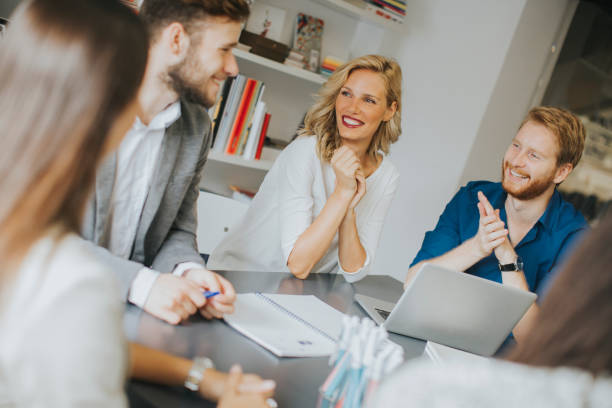 istock Business team working together in modern office 866995284