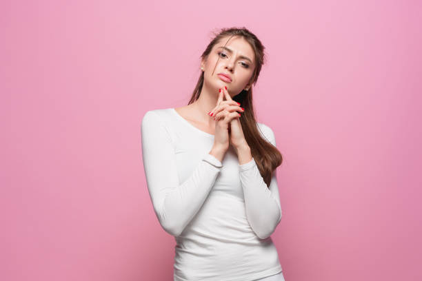 istock The young woman's portrait with proud and arrogant emotions 866995872