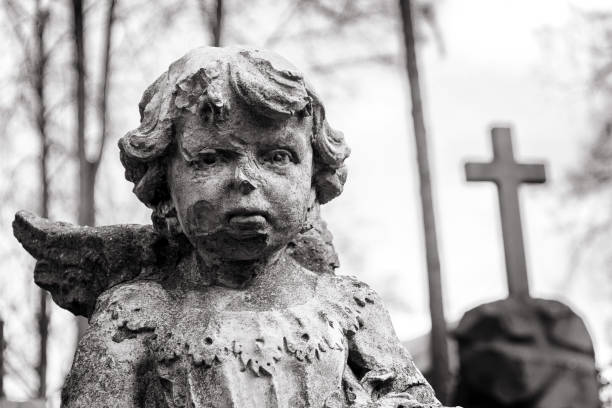 Wrought iron cross in a cemetery
