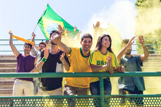 istock Brazilian fans at stadium supporting their team 867009816