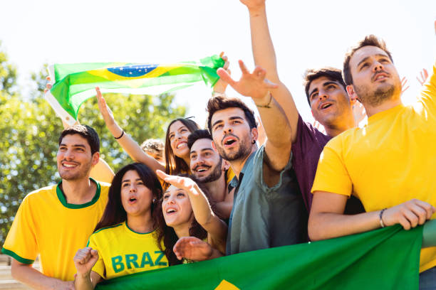 istock Brazilian fans at stadium supporting their team 867009824