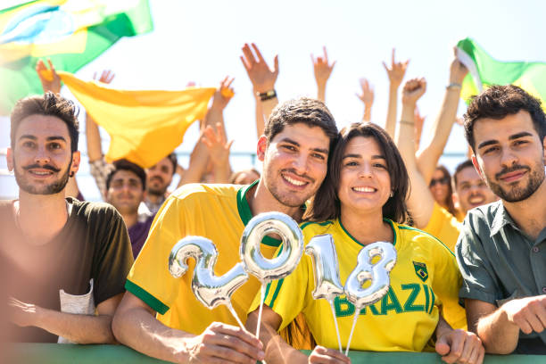 istock Brazilian fans at stadium supporting their team 867009832
