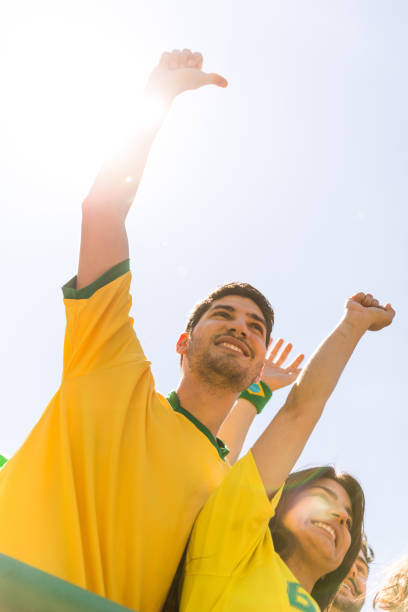 istock Brazilian fans at stadium supporting their team 867009858