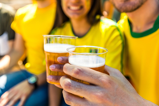 Brazilian fans at stadium supporting their team