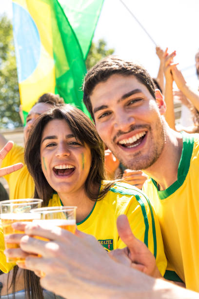 istock Brazilian fans at stadium supporting their team 867009902