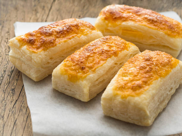 istock few fresh rolls with a delicious crust of puff pastry, close-up, selective focus, 867011572