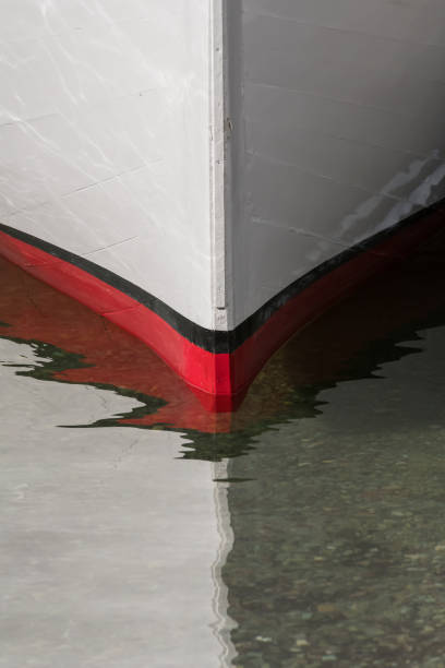 istock Red and White Boat on Calm Lake 867011790
