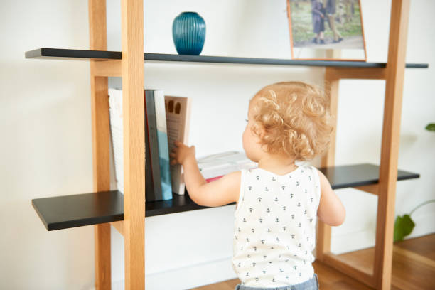 istock Baby boy on his knees looking at something 867015850