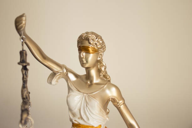 istock White female statue symbol of justice Themis. 867018042