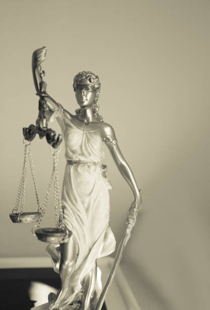 istock White female statue symbol of justice Themis. 867018050