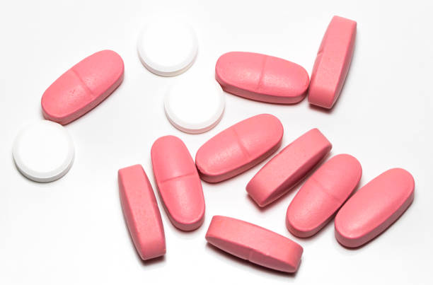 istock handful of pill isolated on white background close-up 867022698