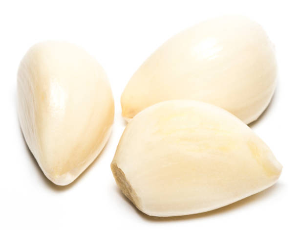istock Fresh garlic isolated on white background close-up 867022732