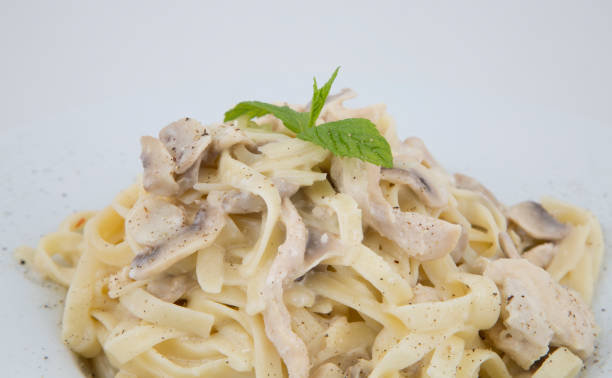istock Tagliatelle with Creamy Porcini Mushroom Sauce 867023938