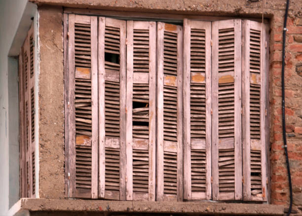 Grunge weathered wooden window shutter in Tire, Turkey