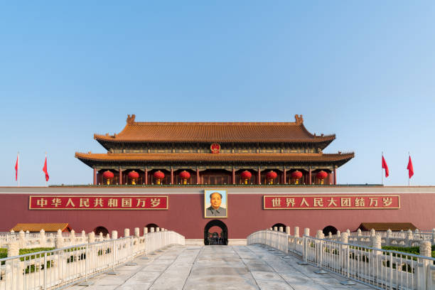Mao Zedong's portrait hangs over Beijing Tiananmen Gate at the Forbidden City in Beijing, China. Mao Zedong's portrait hangs over Beijing Tiananmen Gate at the Forbidden City in Beijing, China. tiananmen square stock pictures, royalty-free photos & images