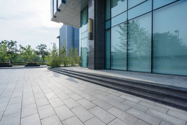 istock modern glass building agaisnt sky 867039512