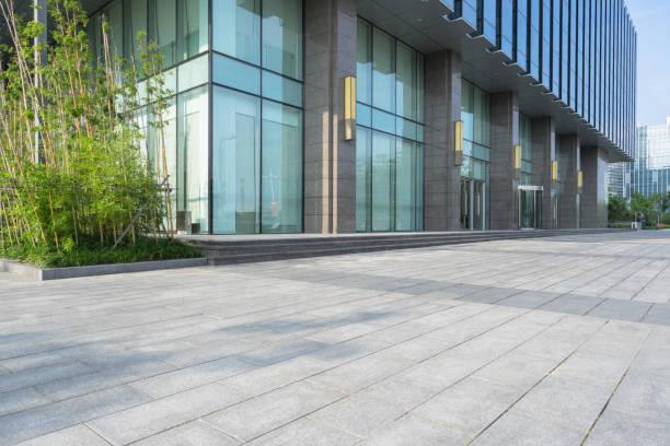 istock modern glass building agaisnt sky 867042570