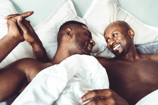 istock gay couple have fun in the bed 867043424