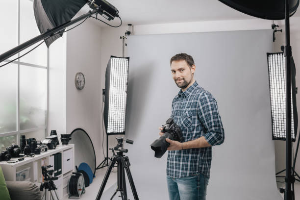 istock Professional photographer posing in the studio 867043856