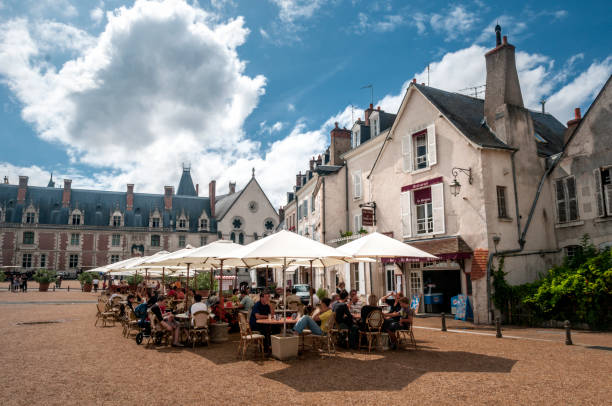 Traditional restaurant in Blois, Paris, France Traditional restaurant in Blois, France. the French and tourists enjoy food and drinks under the sun. Blois area is a popular destinations in France, blois stock pictures, royalty-free photos & images