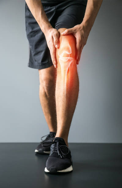 Knee trauma and joint pain-Sports injuries Joint pain, sports injuries, At gym, damaged section, Sportsman, knee bone injury, sports accidents orthopedics joint stock pictures, royalty-free photos & images