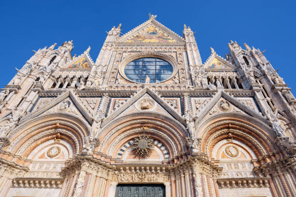 istock Facade of Siena dome (Duomo di Siena), Italy 867082456