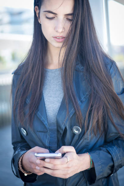 istock Girl messaging on smart phone 867099320