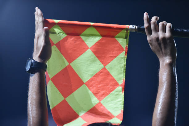 Flag of lineman,assistant referee in competition,signal change player