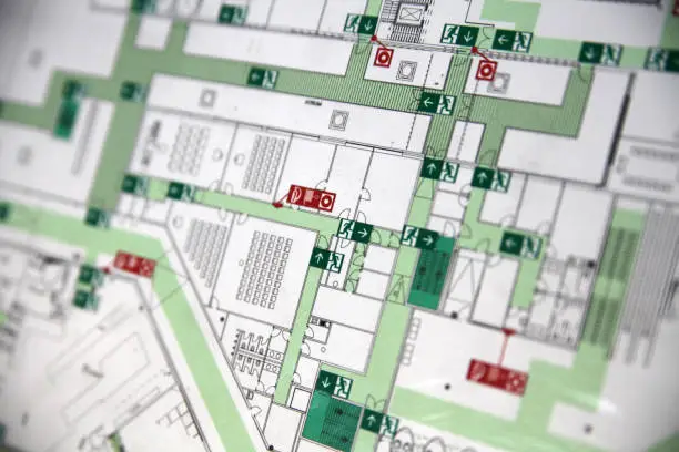 macro crop shot of evacuation plan with emergency exits