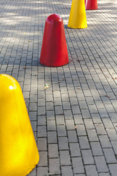 istock number of parking cones stand on sidewalk tile 867113192
